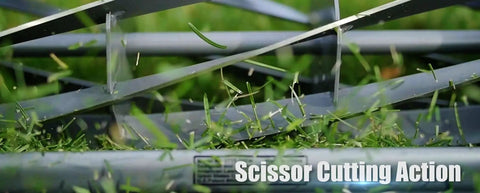 Close-up of 16-Inch 7-Blade Push Reel Lawn Mower With Ball Bearing Reel And 10-Inch Composite Wheels in action cutting grass