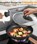 12 Inch Cast Iron Skillet With Removable Wooden Handle Pre Seasoned Fry Pan cooking shrimp and vegetables on stovetop with lid