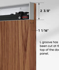 Close-up of concealed sliding barn door with L groove, brown wood, showing soft close hardware kit and hidden rail design.