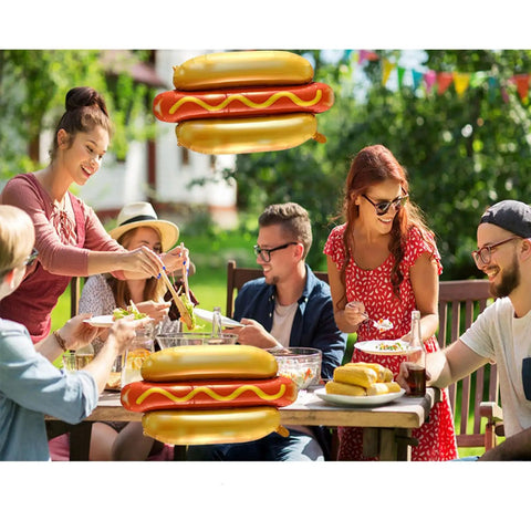 Outdoor party with Six Pack Hot Dog Balloons Set For Food Theme Parties, Summer BBQs And Picnic Decor, 28 Inch Foil Balloons.