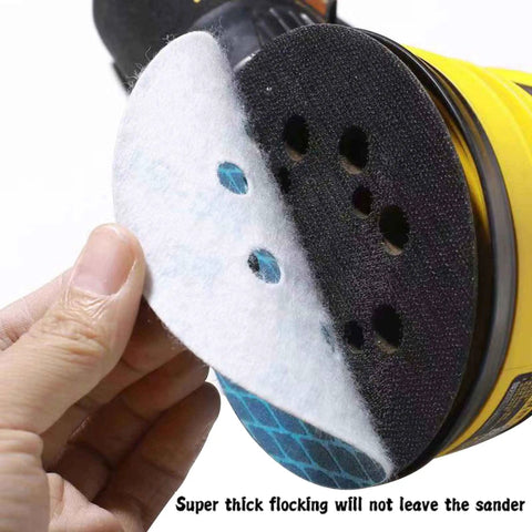 Hand holding a Sander Sandpaper 5 Inch 8 Hole Disc With Hook And Loop Pads 240 Grit for wood and metal, showing blue backing.