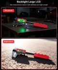 6-Inch Digital Caliper with USB-C Rechargeable Backlight LCD on table, stainless steel design, red handle, clear display in dim and bright light.