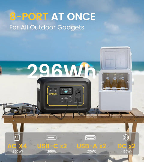 On The Go Portable Power Station 296Wh Backup Battery With 20ms UPS 300W Pure Sine Wave AC Outlet on beach table next to cooler