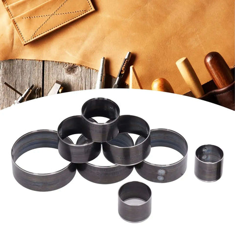 Leather Cutting Dies Set, 8 Pcs Alloy Steel Round Punch Tool Kit for Leather Craft 25-60mm on wooden background with leather tools
