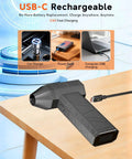 Beast Mode Powerful Cordless Air Duster With 180000 RPM Turbo Fan charging on table, USB-C cable connected