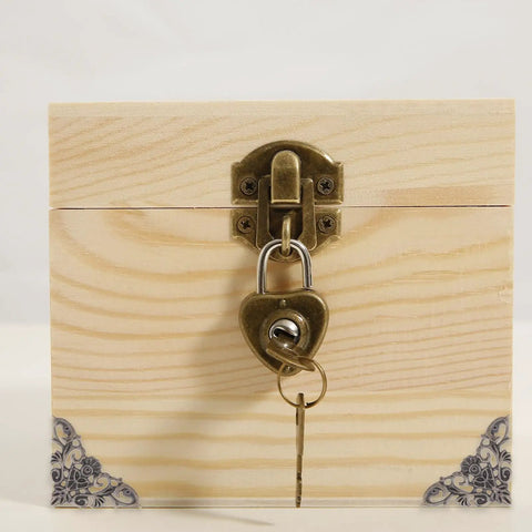 Eight Piece Jewelry Box Corner Protectors Set, Vintage Zinc Alloy Triangle Edge Guards shown on a wooden box with lock and key.