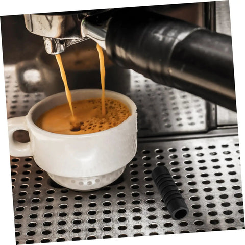 Coffee machine with Insulation Sleeve For Steam Wand Guard And Rubber Cover Heat Shield For Coffee Machines next to cup.