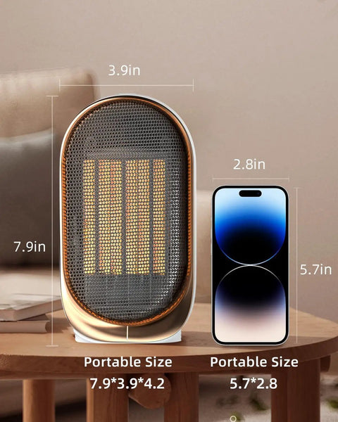 Portable Mini Space Heater With 1000W Heating, 2 Speed Fan next to smartphone for size comparison on table.