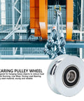 Groove Roller Wheel Bearing Pulley With 64Mm Outer Diameter And 15Mm Center Hole, Alloy Steel Guide Wheel displayed in industrial setting