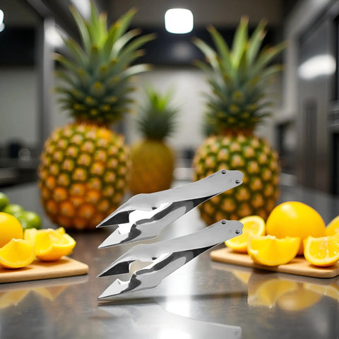 Stainless Steel Pineapple Eye Remover And Core Cutter With V Shaped Tip displayed on a kitchen counter surrounded by fresh pineapples and lemons.
