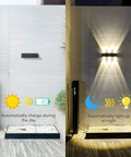 Outdoor Solar Lights 3000K Warm Aluminum Up And Down Wall Sconce Waterproof Dusk To Dawn 2 Pack charging in day, lighting at night