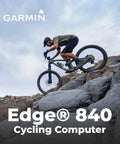 Cyclist using Edge 840 GPS Cycling Computer With Touchscreen And Button Controls on rocky trail, showcasing advanced navigation.