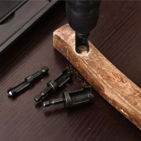 Bromirix 8-piece black wood plug cutter set on dark wood surface; straight and tapered bits with 1/4 in hex shanks