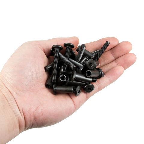 Forty Sets Black M6X40MM Furniture Connector Bolts And Cap Nuts Assortment Kit With Matching Drive Tool For No Sweat Wood Assembly and DIY Cabinet Hardware That Actually Holds Tight, held in a hand.