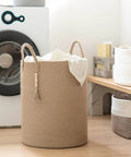 Boho Jute Laundry Hamper Basket With Handles Tall Wicker Hamper near washer, 16 x 20 inches, natural decor in laundry room.