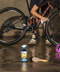 Palm Oil Free Bike Cleaner and Wet Lube Bundle for All Weather Riding Made in UK with a Non Freezing Formula shown with bike and helmet