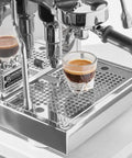 Close-up of Appartamento TCA Espresso Machine Black On Black For Home Coffee Setup with Hybrid PID Temperature Control brewing espresso.