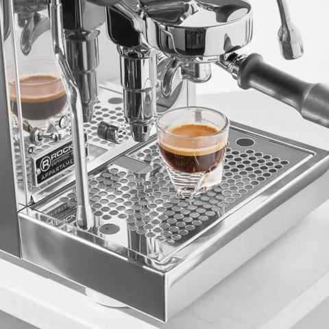 Close-up of Appartamento TCA Espresso Machine Black On Black For Home Coffee Setup with Hybrid PID Temperature Control brewing espresso.