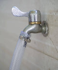 Three Quarter Inch ID By One Inch OD High Pressure Braided Clear PVC Tubing Ten Foot Heavy Duty Flexible Vinyl Hose attached to faucet