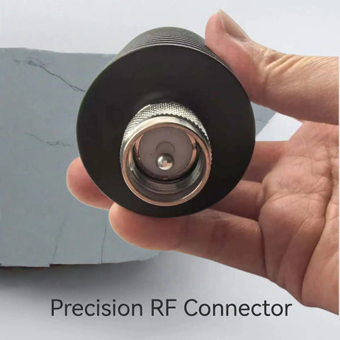 Pro Grade 50 Watt 50 Ohm UHF PL259 Dummy Load For Ham Radio And Antenna Testing shown in hand, close-up view