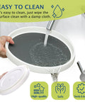 Set Of 4 10 Inch Rotating Lazy Susan Organizer With Non Skid Beaded Surface being rinsed under tap water for easy cleaning