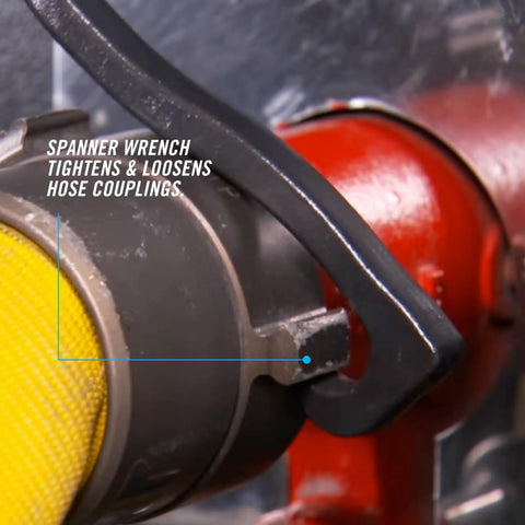Close-up of Rescue Tool 87 Lightweight 8.88 Inch Firefighter Tool using spanner wrench on hose coupling for quick access.