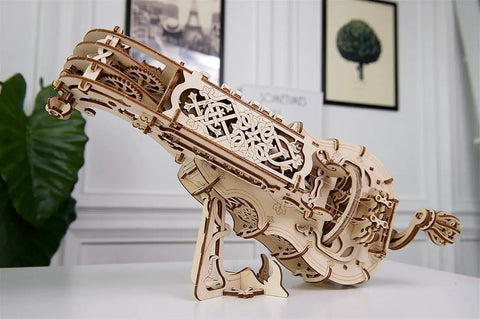 Hurdy Gurdy Mechanical 3D Wooden Model Kit With Hand Crank Functional DIY Musical Instrument For DIYers And Makers Two Strings Melody And Drone Realistic Gear Action 40 X 22 X 16.5 Cm Model 70030 wooden hand-crank model on stand