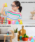 Eight Piece Science Measuring Flask Set For Kids Including Colorful 30ml Graduated Cylinders And Plastic Beakers in use by child and at home