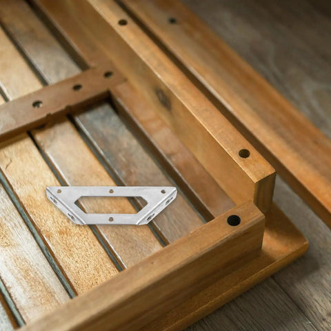 4 Pack Stainless Steel Corner Brackets for Cabinets and Shelves, Heavy Duty 90 Degree Angles on wooden surface