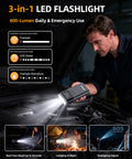 Man using Beefy 6000A Jump Starter With Air Compressor For Cars And 14L Diesel Engines LED light under car hood