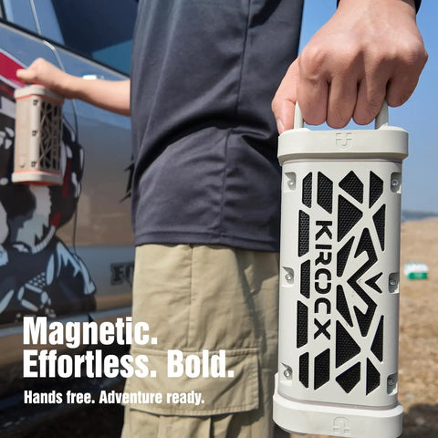 Person holding Rugged Aluminum Bluetooth Speaker With 45W Power Deep Bass IP68 Waterproof Magnetic Mounting TWS Pairing