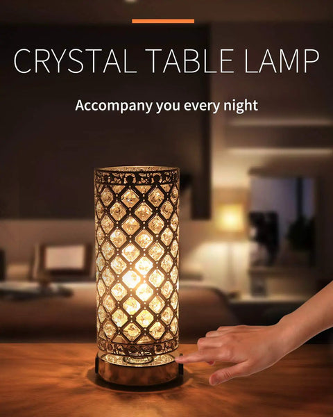 Crystal Table Lamp With 3 Way Dimmable Touch Control, lit on table in cozy bedroom setting, silver finish