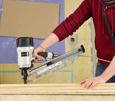 Person using the Beefy Framing Nailer 21 Degree Three And One Half Inch Pro Grade With Depth Adjustment And Tool Free Depth Of Drive