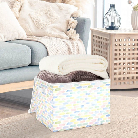 Rugged Foldable Storage Bin With Flip Top Lid And Sturdy Handles For Home Organization Bedroom Closet Collapsible Box Crafted With Durable 300D Oxford Fabric And Velcro Closure To Secure Your Gear Big Time storing blankets in a cozy living room.