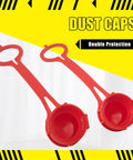 Red protective dust caps for hydraulic quick connect couplers.