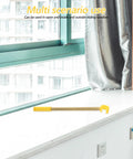 0.4m Adjustable Window Catch Pole Tool For High Windows Ergonomic Tension Rod on windowsill in urban setting
