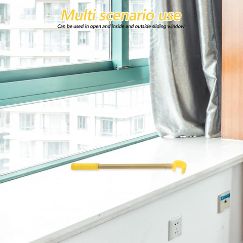 0.4m Adjustable Window Catch Pole Tool For High Windows Ergonomic Tension Rod on windowsill in urban setting