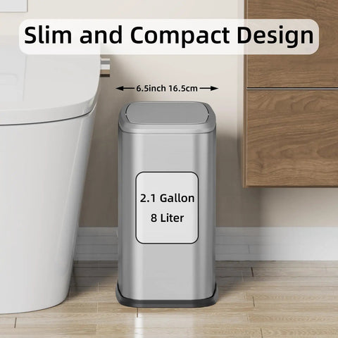Slim Swing-Top Rectangular Trash Can 8L Stainless Steel, Small Waste Bin placed beside toilet, showing slim compact design.