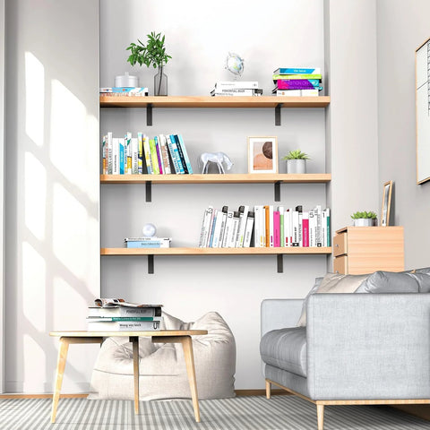 Living room with bookshelves supported by Heavy Duty 10 Inch L Shaped Shelf Brackets 6 Pack, holding books and decor.