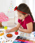 Girl crafting with 11000 Piece Fuse Beads Kit With 36 Colors For Totally Creative Crafting For Girls Aged 5 To 12 at table