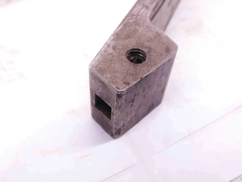 Close-up of Four Piece Vintage Lathe Tool Holder Set Featuring Sick Precision Cutoff And Parting Turning Inserts in carbon steel.