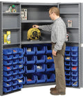 Heavy Duty Steel Storage Cabinet Kicking Chaos To The Curb With Forty Eight Small And Sixteen Large Blue Bins, in use for organizing tools.