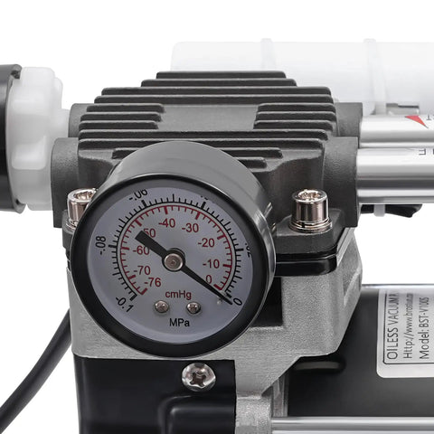 Solid pressure gauge on heavy duty oilless vacuum pump that runs like a dream with 50 liters per minute output and 150 watt pure copper motor.