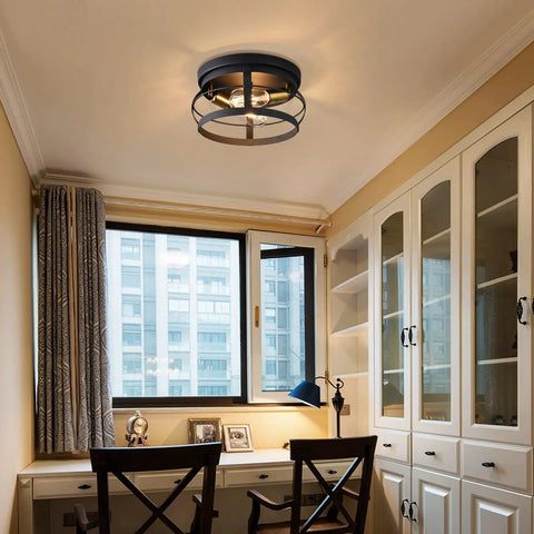 2-light farmhouse flush mount ceiling light in black finish, 11.4-inch fixture with metal cage illuminating a home office