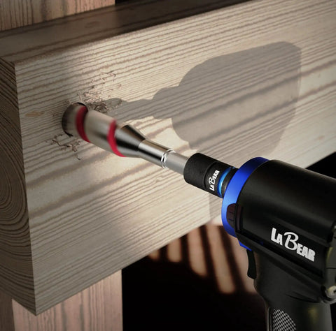 Impact Wrench Adapter Half Inch Drive Female To Seven Sixteenths Hex Converter With Quick Release Chuck in use on wood