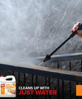 Citrus Paint Stripper Gel For Wood And Metal Surfaces Quick Acting One Application Formula in use with a pressure washer on outdoor furniture.