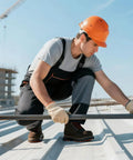Worker wearing Mens Steel Toe Work Boots Built For The Job Like Construction And Welding, Puncture Resistant And Slip Resistant on site