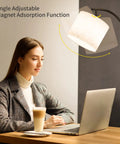 Arc Floor Lamp With Remote And Stepless Dimming Dope Modern Metal Standing Lamp With Hanging Lampshade For Living Room Bedroom Or Office Black Finish Easy Color Temp And Brightness Control shown in use next to a woman working on a laptop.