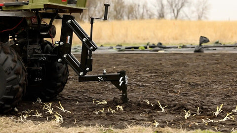 Middle Buster Furrower Attachment For Subsoil Work From Impact Implements in action, heavy duty tool breaking up soil