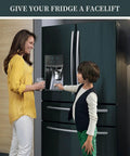 Mother and son in front of dark green fridge with stainless steel look peel and stick contact paper installed for a facelift.